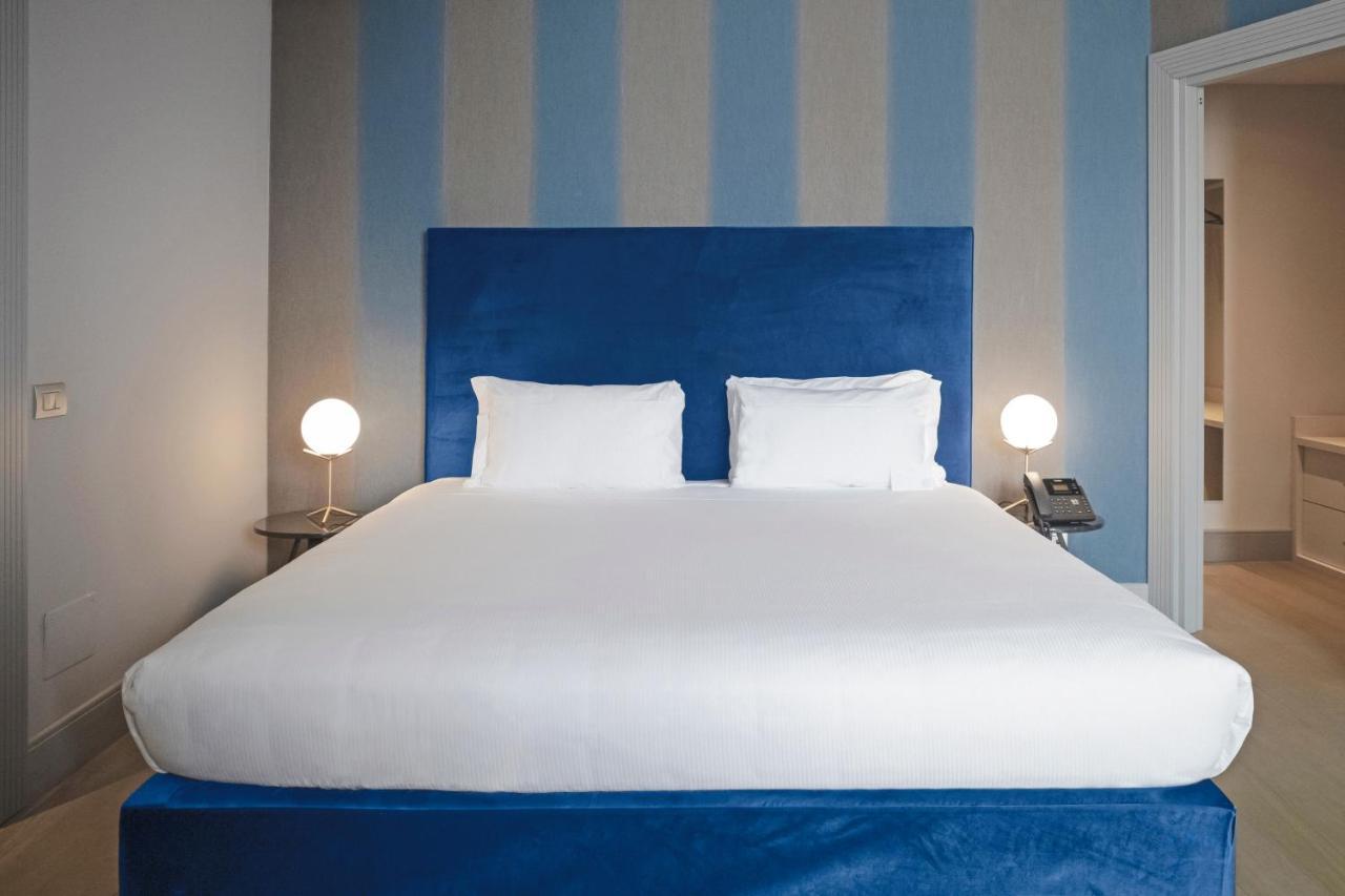 Palazzo Cornalia Hotel Milan Luaran gambar A bedroom at the hotel