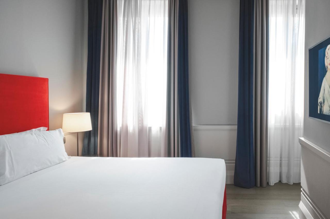 Palazzo Cornalia Hotel Milan Luaran gambar A bedroom at the hotel