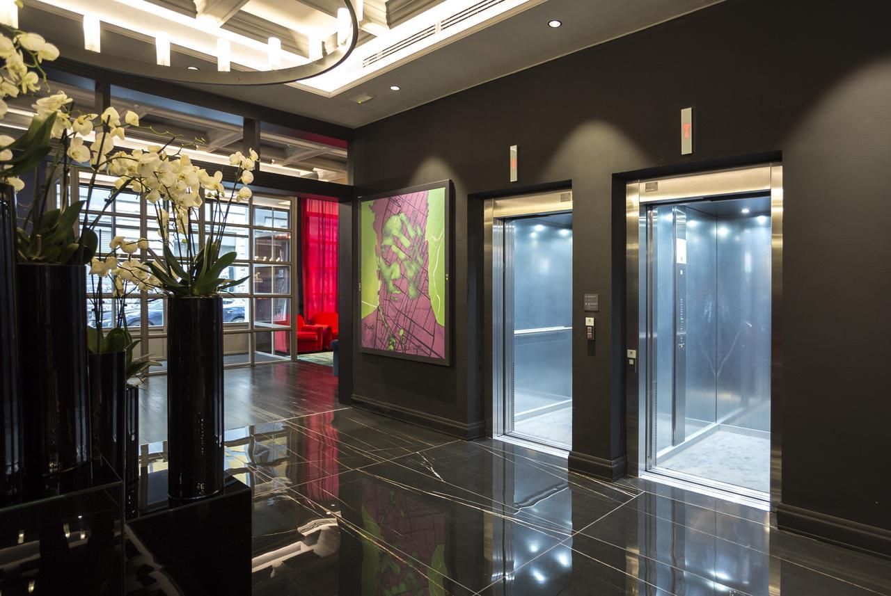 Palazzo Cornalia Hotel Milan Luaran gambar Elevators in a hotel