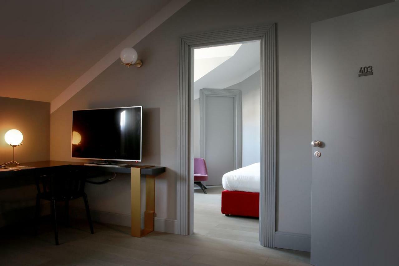 Palazzo Cornalia Hotel Milan Luaran gambar A room at the hotel